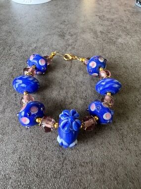 Handcrafted Blue Lampwork Glass Bead Bracelet with Pink Accents